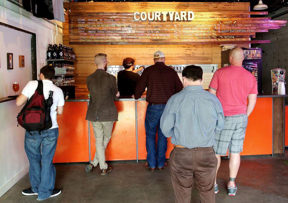 Brew by the route: in Mid-City and Uptown, a pair of microbrewers pour it on for parade days _lowres